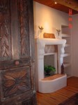 Antique doors lead to master bedroom fireplace.